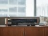 Can You Still Buy a VCR? Can you still buy a VCR? A JVC VHS video cassette recorder on a media cabinet in a modern living room.