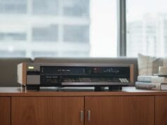 Can You Still Buy a VCR? Can you still buy a VCR? A JVC VHS video cassette recorder on a media cabinet in a modern living room.