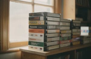 How long do VHS tapes last? How long do VHS tapes last? A collection of old VHS videocassette tapes stacked on a shelf by a window.